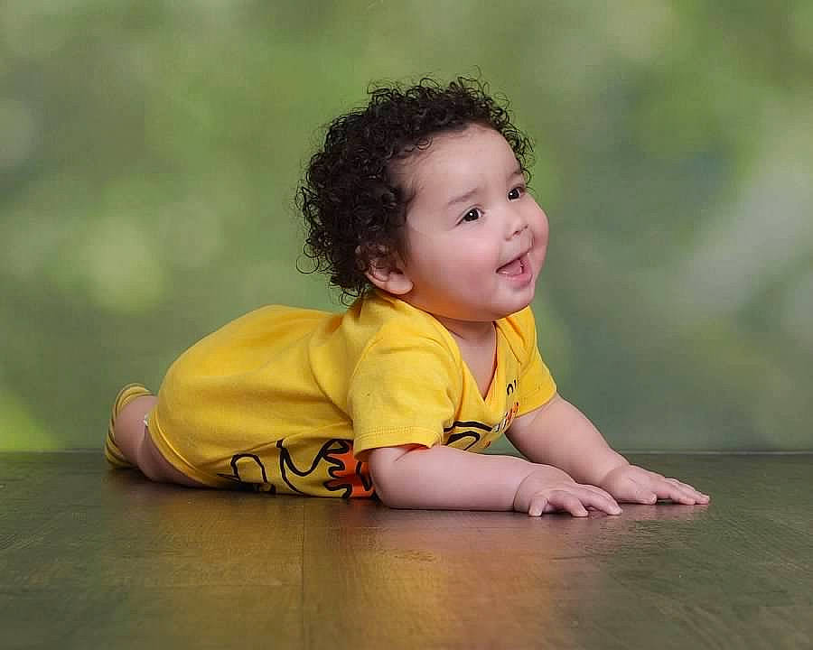 Jadiel joined the competition — help win amazing prizes! baby, baby_crawling, baby_toddler_clothing, child, crawling, face, flash_photography, flooring, grass, happy, hardwood, human_leg, leisure, people_in_nature, person, sitting, skin, sleeve, smile, toddler