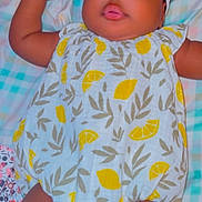 Steph-Danalia joined the competition — help win amazing prizes! adorable, baby, blanket, bow, child, chubby_cheeks, clothing, curious_eyes, cute, expression, headband, indoors, infant, lemon_pattern, lying_down, pastel_colors, portrait, romper, skin, soft_lighting