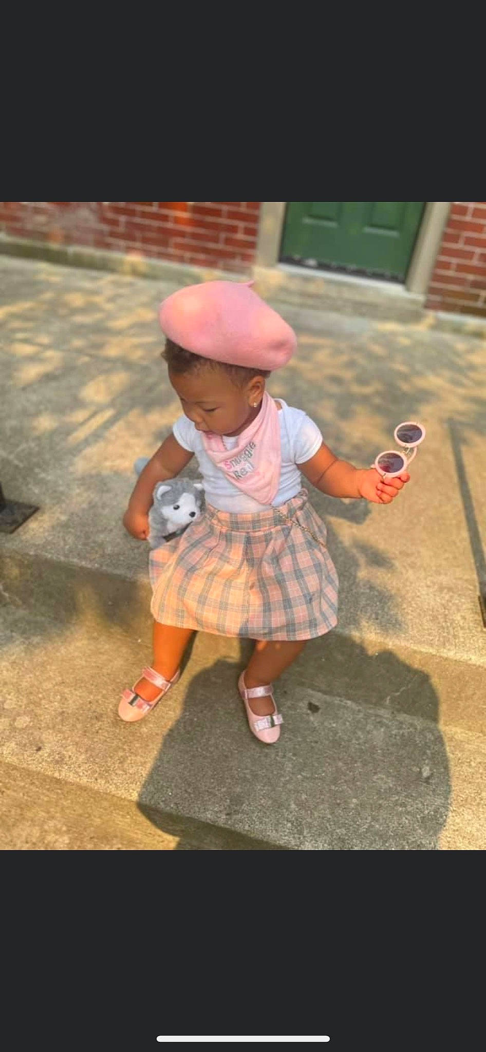 Aribella is registered to the contest to win money with this photo: child, flooring, fun, grass, hat, human_leg, leisure, pattern, person, plaid, play, recreation, road_surface, sandal, shoe, sidewalk, sock, street_fashion, tartan, toddler