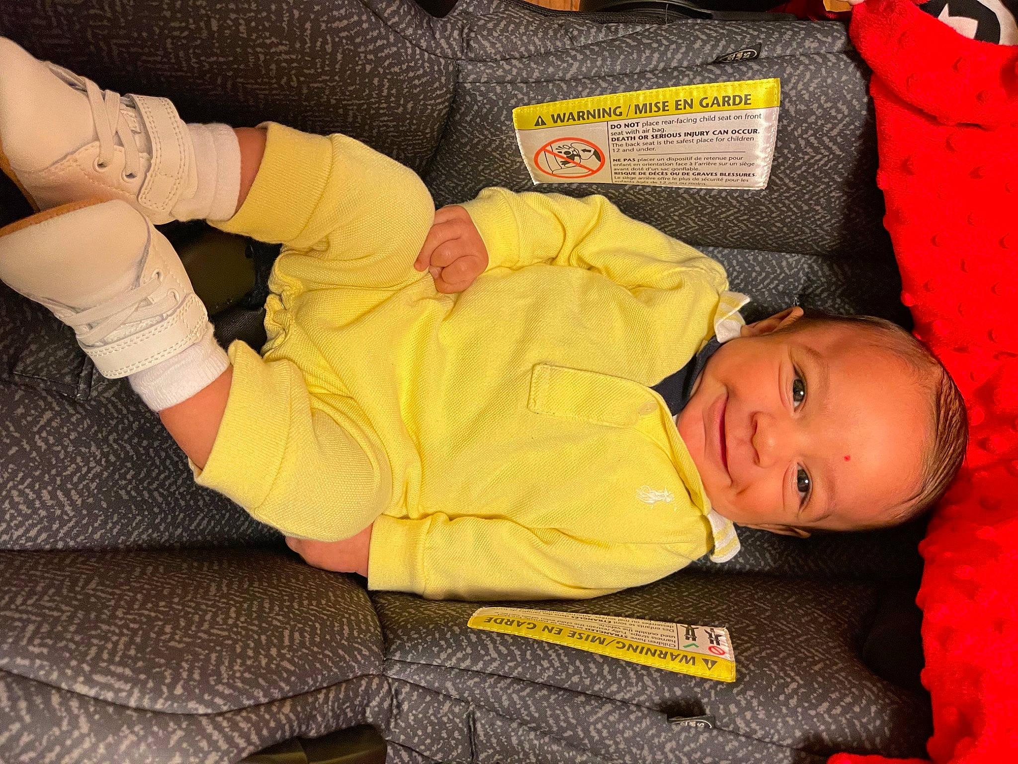 Asa joined the competition — help win amazing prizes! baby, baby_products, baby_toddler_clothing, beauty, child, comfort, facial_expression, gesture, human_body, human_leg, joy, knee, lap, mammal, orange, person, room, sleeve, thigh, thumb