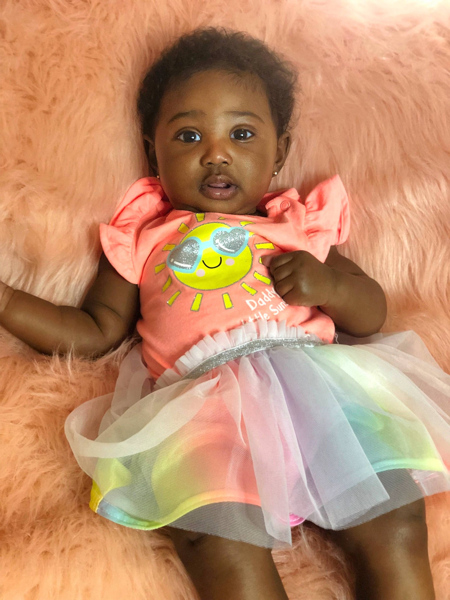 Hadiya is registered to the contest to win money with this photo: abdomen, arm, baby, baby_playing_with_toys, baby_products, baby_toddler_clothing, child, finger, fun, happy, iris, leisure, nail, person, pink, product, skin, stuffed_toy, textile, toddler