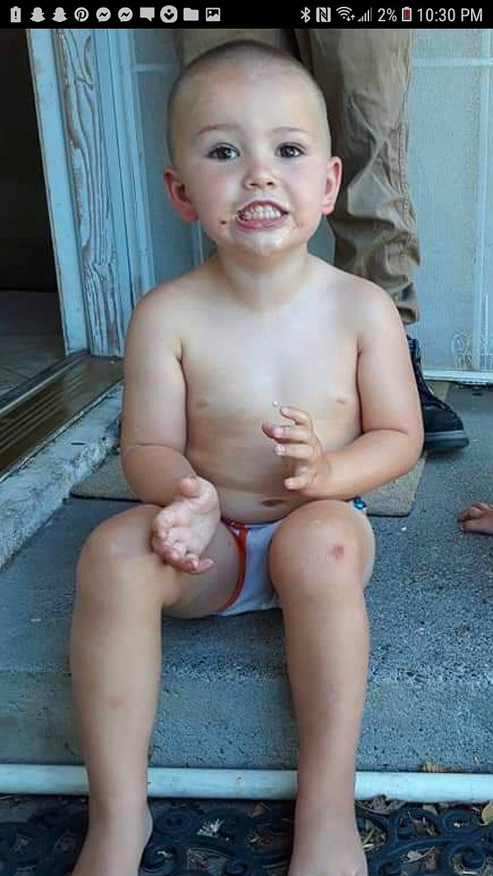 Brendan is registered to the contest to win money with this photo: baby, cheek, chest, child, person, sitting, toddler