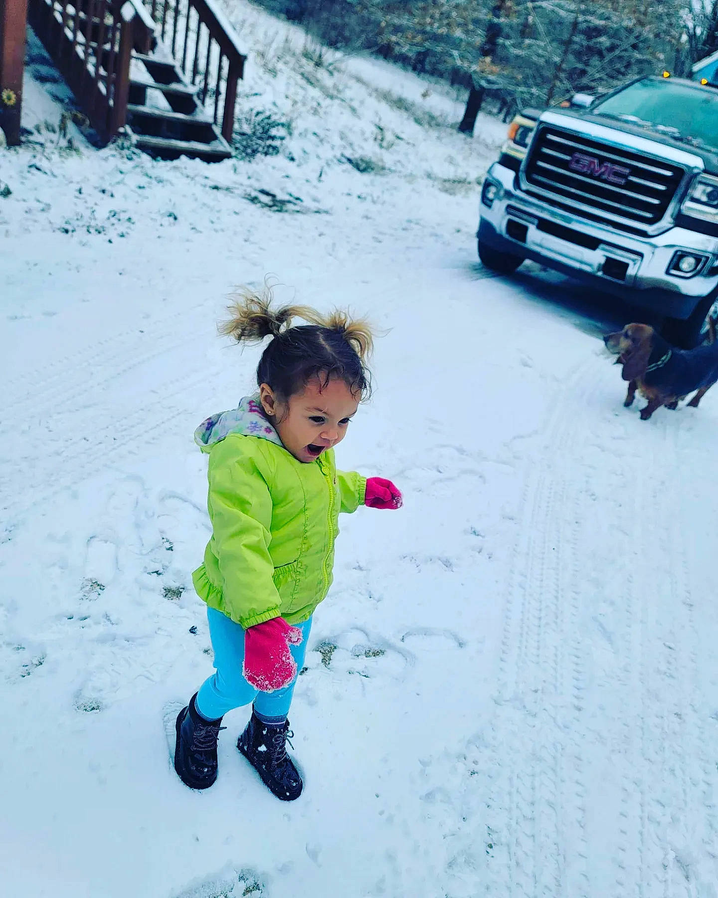Raylynn joined the competition — help win amazing prizes! automotive_design, automotive_exterior, automotive_lighting, automotive_tire, beauty, bumper, car, fender, freezing, grille, motor_vehicle, people_in_nature, person, public_space, slope, snapshot, snow, toddler, vehicle, white