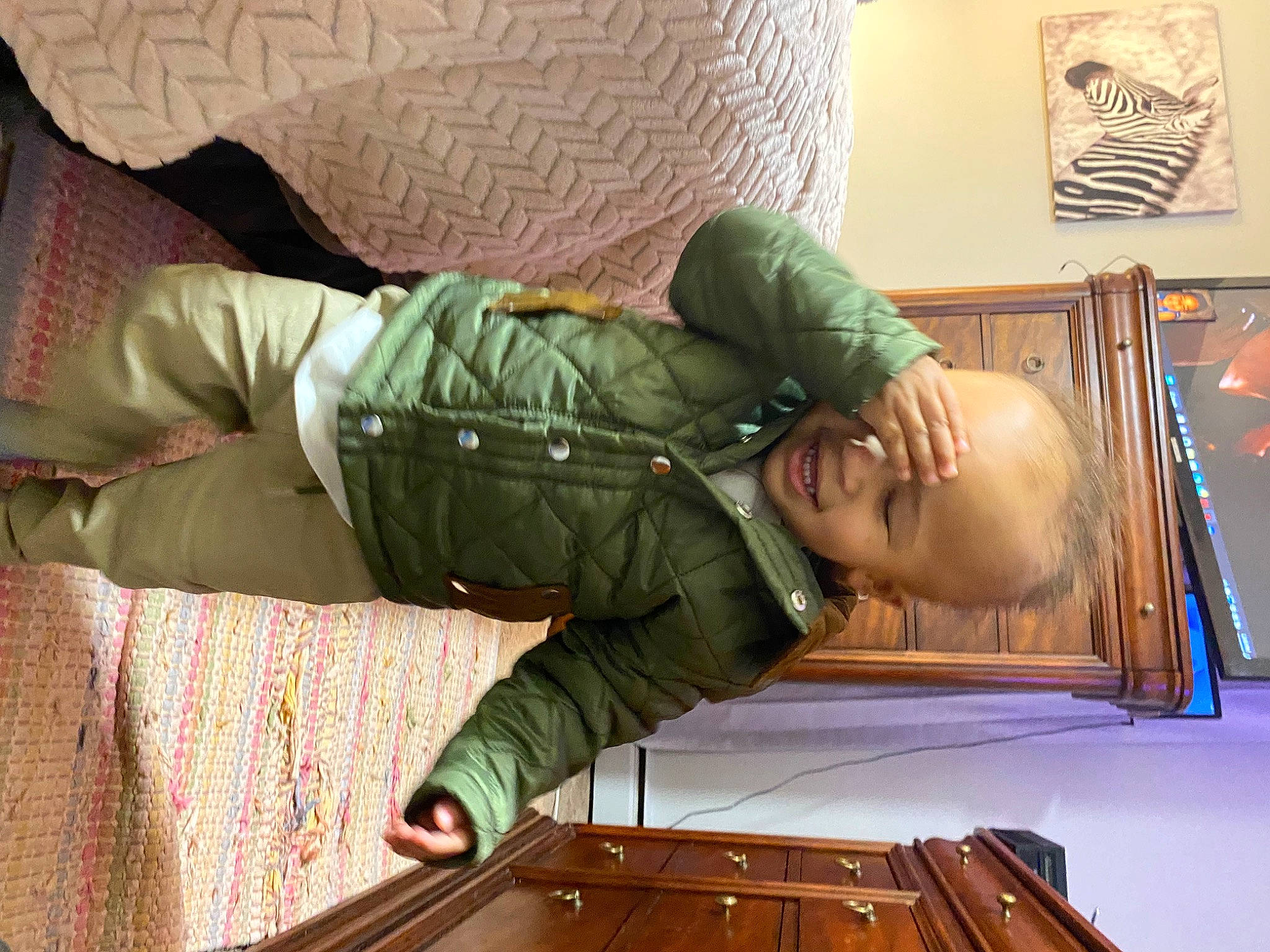 Phoenix joined the competition — help win amazing prizes! baby, bedding, child, comfort, flooring, hardwood, linens, military_camouflage, nap, pattern, person, room, sitting, sleep, toddler, varnish, wood