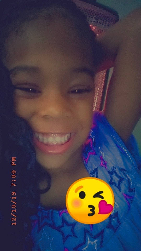 Amy is registered to the contest to win money with this photo: beauty, black_hair, blue, cheek, child, eye, eyebrow, face, facial_expression, forehead, fun, hair, happy, head, joy, lip, nose, person, selfie, skin