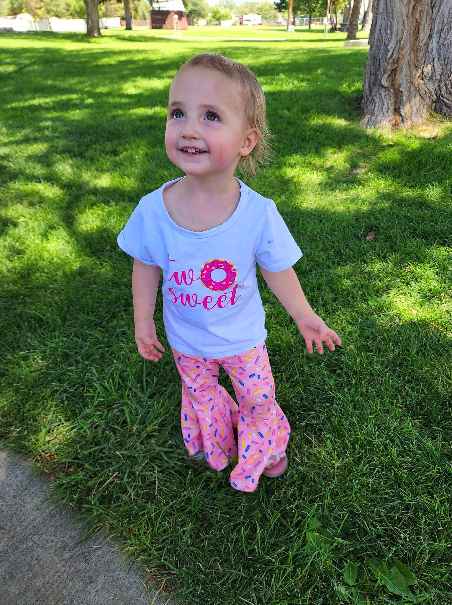 Lilas joined the competition — help win amazing prizes! baby_toddler_clothing, botany, child, face, grass, grass_family, groundcover, happy, head, joy, leaf, leisure, meadow, people_in_nature, person, plant, sleeve, smile, t_shirt, tints_and_shades