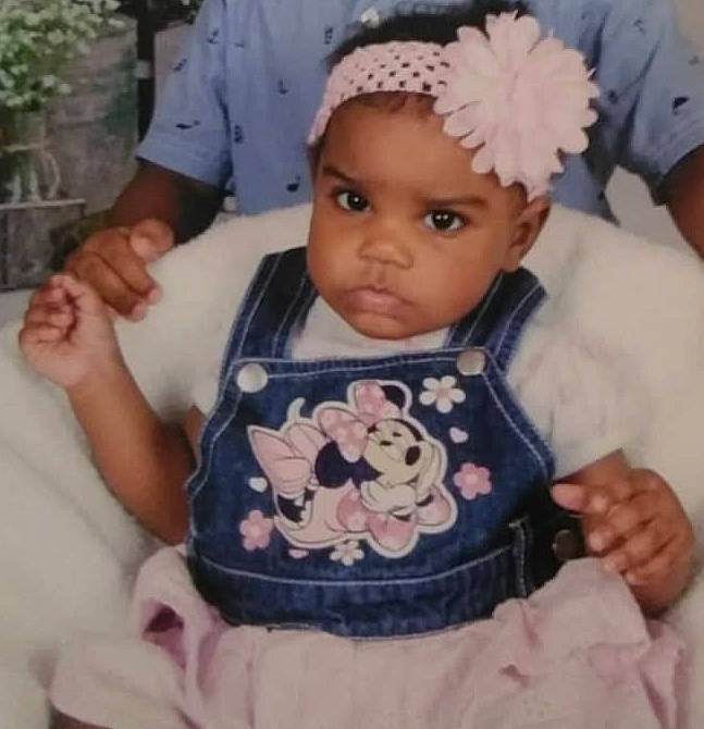 Brooke is registered to the contest to win money with this photo: baby, baby_products, baby_toddler_clothing, cheek, child, hair_accessory, headband, headgear, headpiece, headwear, person, pink, product, toddler