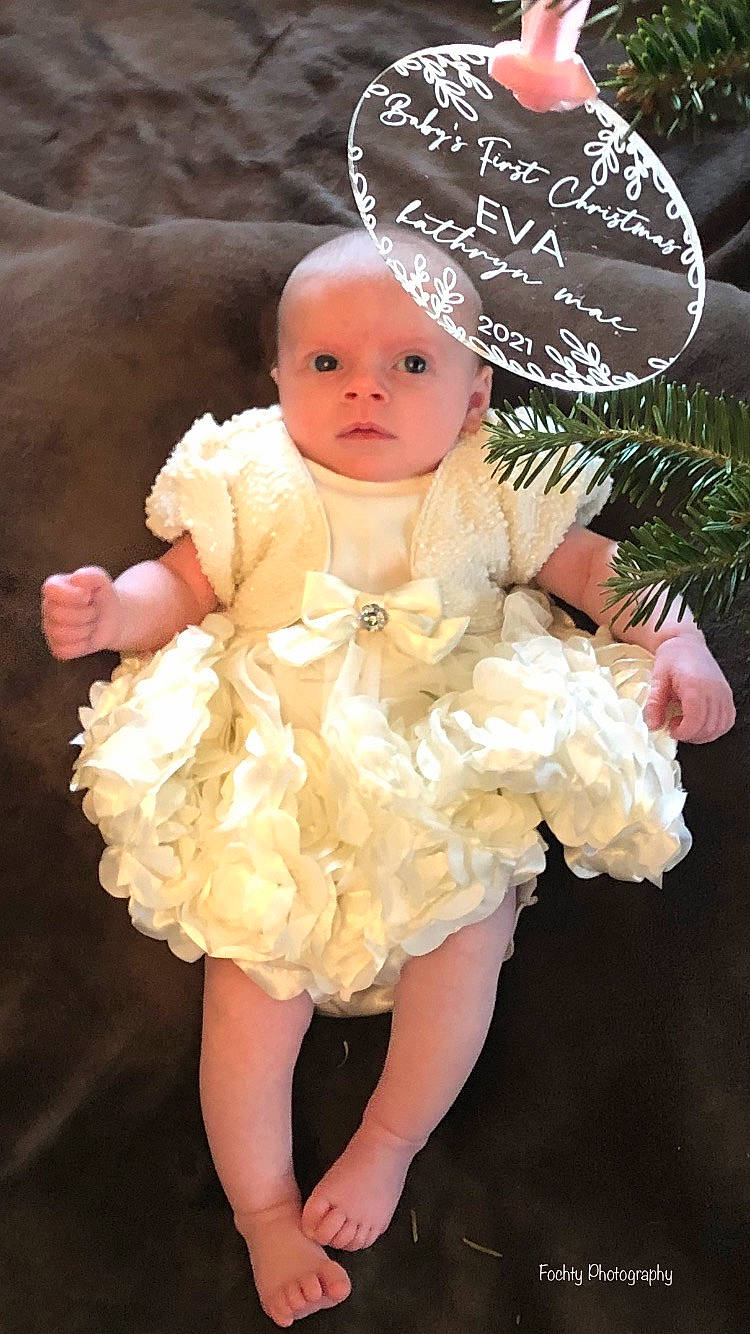 Eva is registered to the contest to win money with this photo: angel, baby, baby_toddler_clothing, bridal_accessory, dress, embellishment, event, fashion_design, hair_accessory, hand, happy, headgear, headpiece, headwear, peach, person, petal, pink, plant, skin