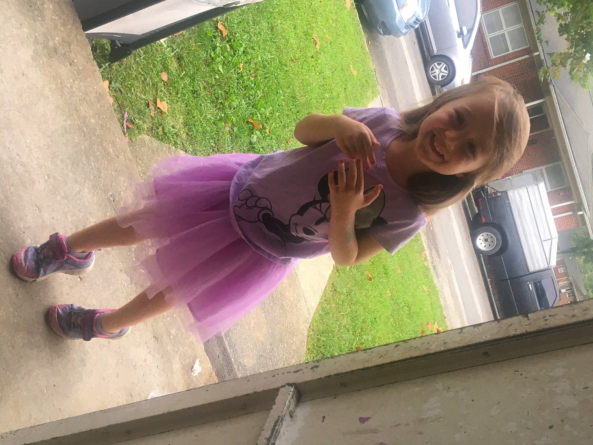 Natalina is registered to the contest to win money with this photo: auto_part, automotive_exterior, automotive_window_part, car, child, family_car, fun, glass, grass, joy, leisure, magenta, person, plant, smile, thigh, tints_and_shades, tire, toddler, tree