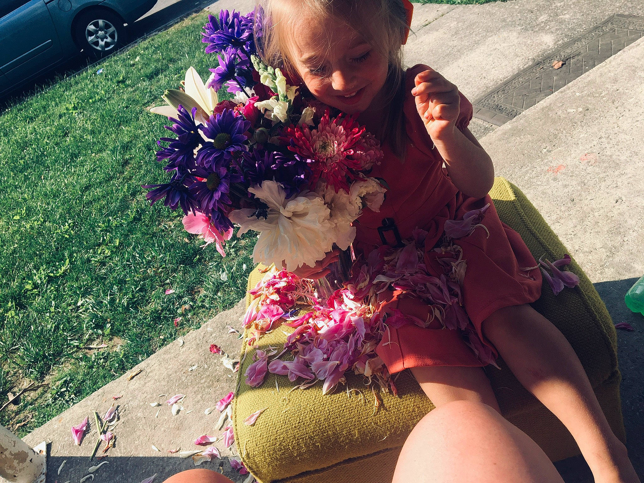 Natalina is registered to the contest to win money with this photo: annual_plant, beauty, flower, flower_arranging, fun, grass, green, happy, human_leg, joy, magenta, person, petal, pink, plant, shrub, summer, thigh, tints_and_shades, toddler