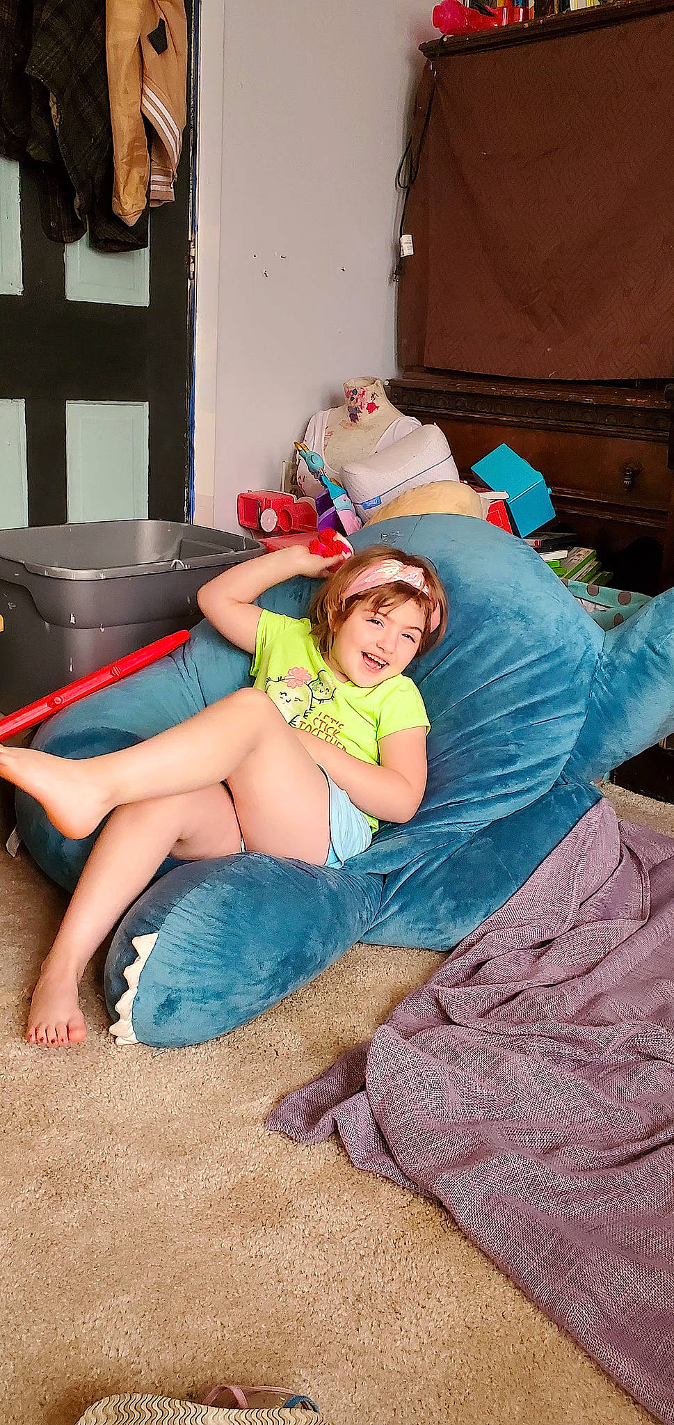 Lilliana joined the competition — help win amazing prizes! barefoot, child, comfort, event, foot, fun, happy, human_leg, joy, knee, lap, leg, leisure, person, room, sandal, shorts, sitting, smile, t_shirt