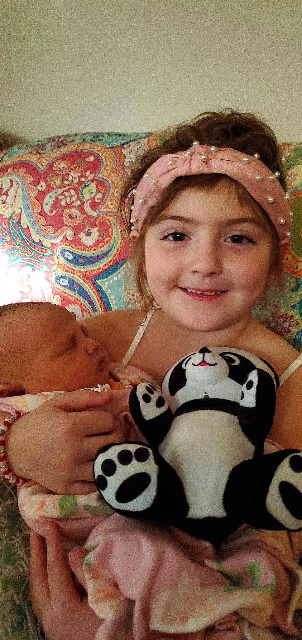 Lilliana is registered to the contest to win money with this photo: arm, cheek, child, couch, eye, facial_expression, football, fun, happy, headwear, iris, joy, lip, mouth, nose, organ, people, person, skin, smile