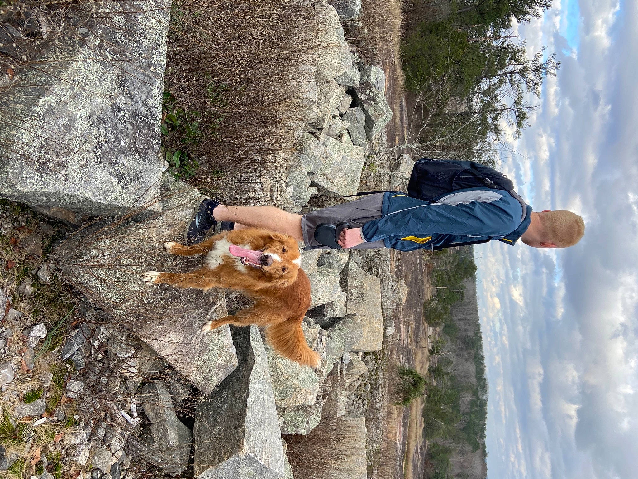 Rambo is registered to the contest to win money with this photo: adventure, bedrock, cloud, doll, fawn, fun, geological_phenomenon, geology, happy, landscape, leisure, people_in_nature, plant, recreation, rock, sky, toy, tree, trunk, wood