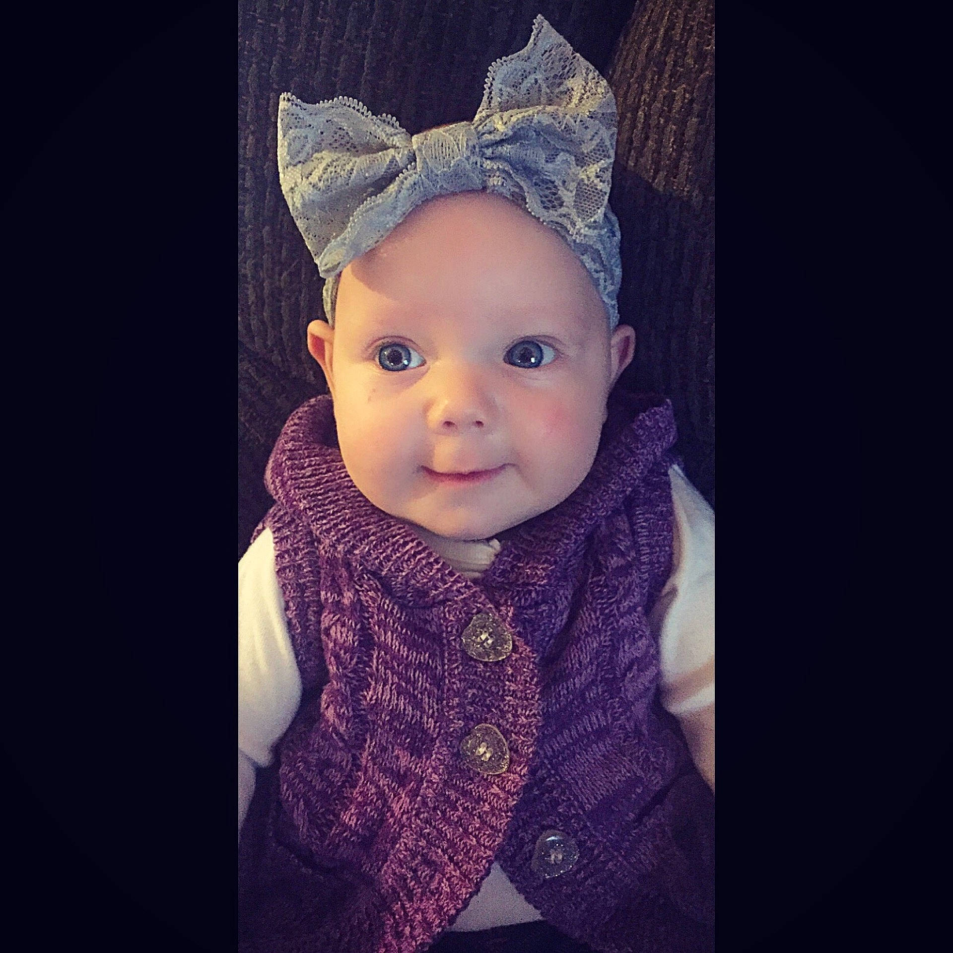Aella is registered to the contest to win money with this photo: cheek, child, eye, girl, hair_accessory, headgear, headpiece, infant, iris, knitting, outerwear, person, portrait, portrait_photography, purple, smile, toddler