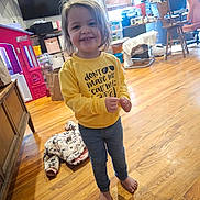 Raelynn joined the competition — help win amazing prizes! architecture, building, child, clothing, electronics, face, furniture, hardwood, head, indoors, interiordesign, jeans, livingroom, pants, person, photography, portrait, room, screen, wood