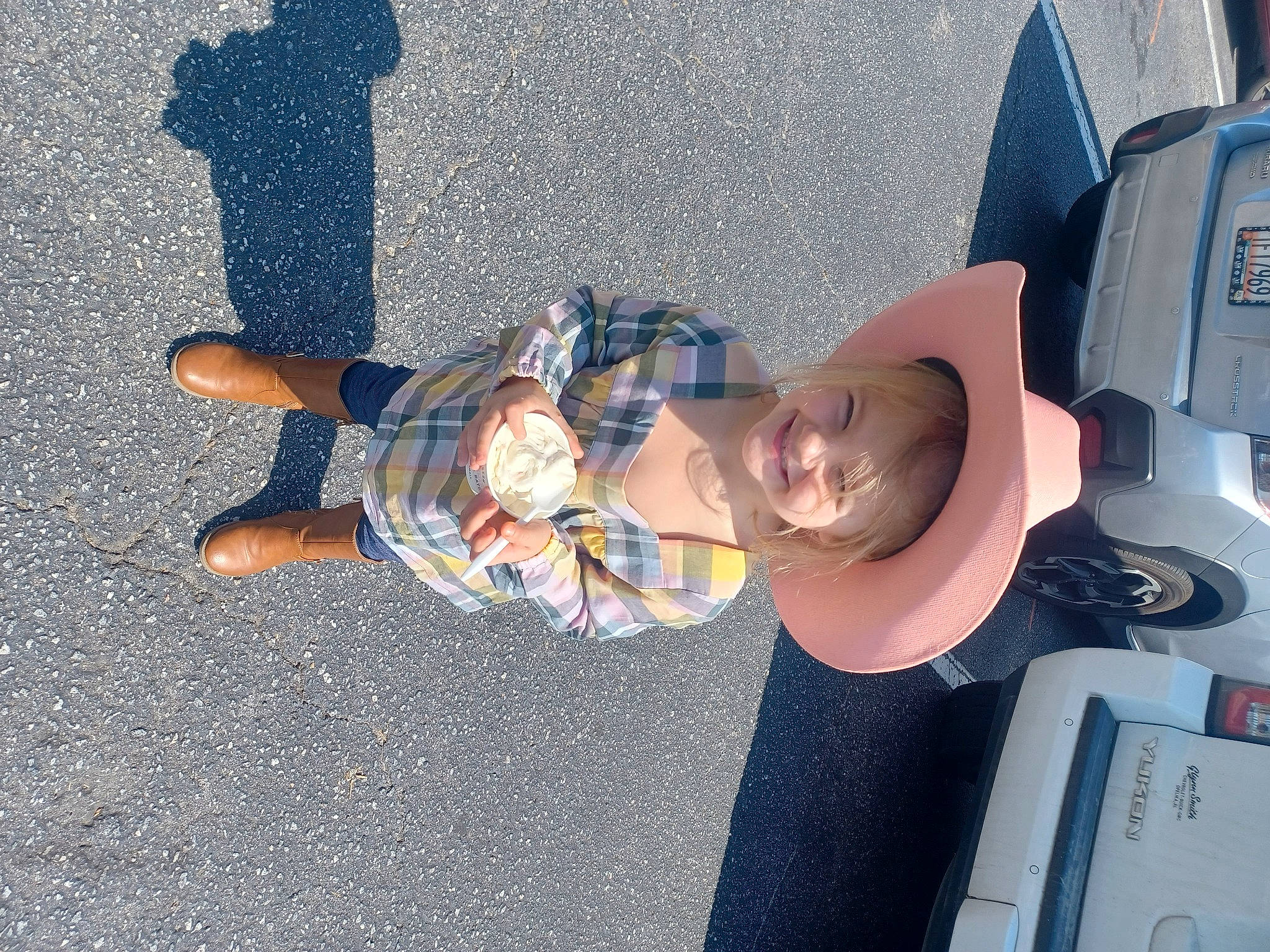 Alivia joined the competition — help win amazing prizes! asphalt, auto_part, automotive_exterior, baby, bumper, child, concrete, electric_blue, family_car, foot, fun, hat, human_leg, joy, person, road_surface, shadow, sidewalk, smile, toddler