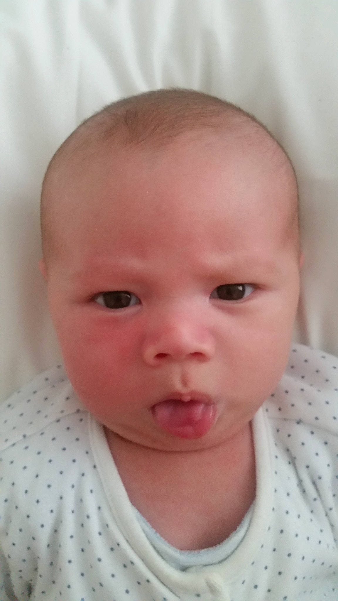 Jj is registered to the contest to win money with this photo: baby, baby_making_funny_faces, cheek, child, chin, close_up, ear, eye, eyebrow, face, facial_expression, forehead, head, iris, lip, mouth, nose, person, skin, smile