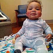 Jj joined the competition — help win amazing prizes! architecture, baby, building, clothing, couch, cushion, face, footwear, furniture, head, homedecor, indoors, livingroom, pants, person, photography, portrait, room, shoe, sitting