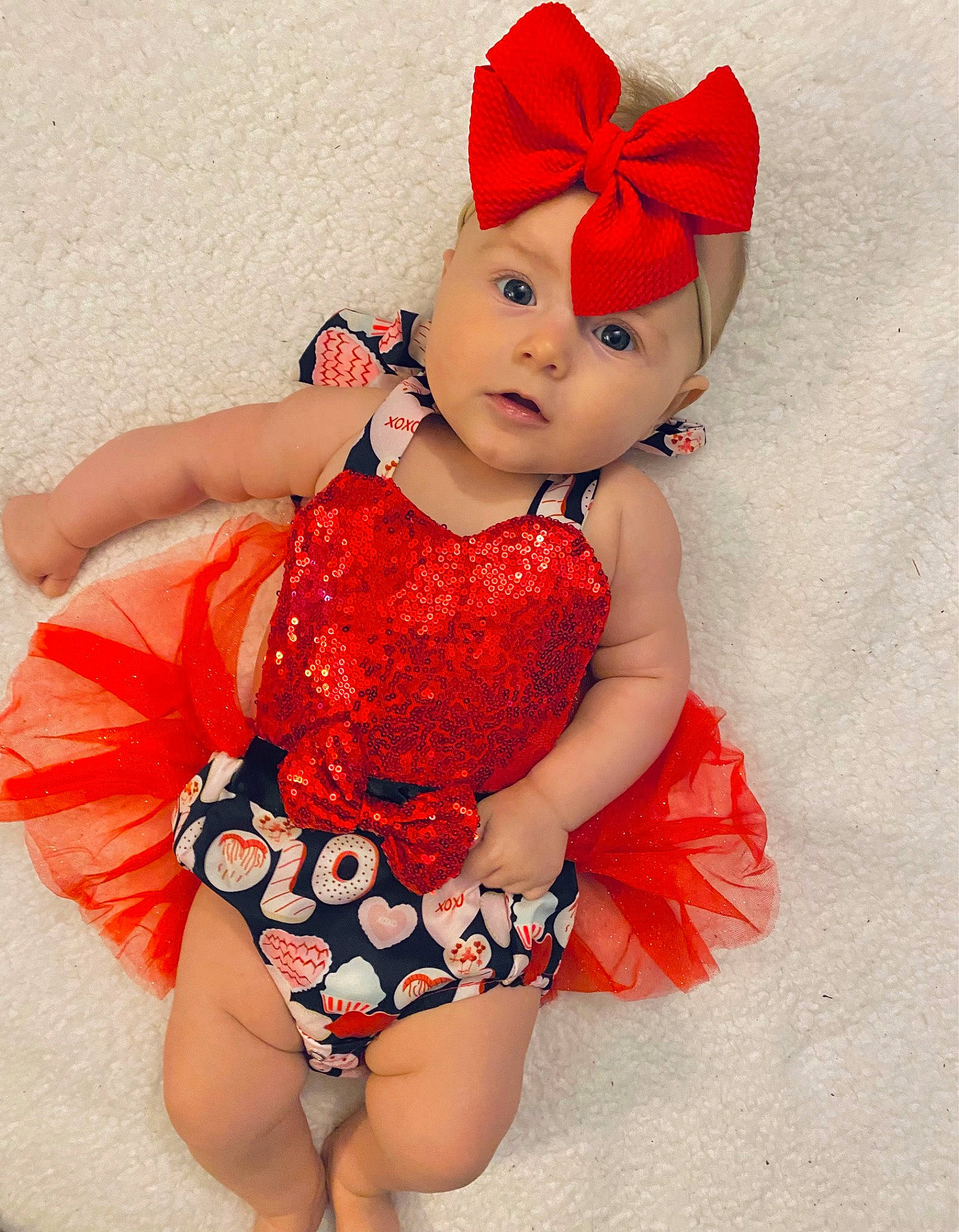 Haven joined the competition — help win amazing prizes! arm, baby_toddler_clothing, cap, costume_hat, dress, eye, face, finger, hat, head, headwear, human_body, one_piece_garment, pattern, person, pink, plant, red, sleeve, thigh