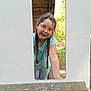 Younala participe au concours pour gagner de l'argent avec cette photo : blue_shirt, braids, casual_clothing, child, cutout, daylight, fun, girl, glasses, greenery, happy, jeans, nature, outdoor, panel, person, play, portrait, smiling, wood