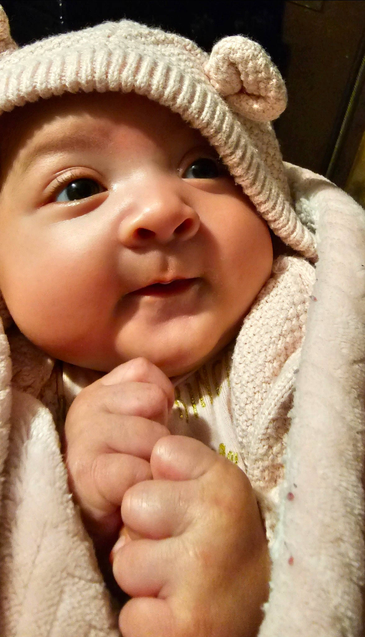 Ailani is registered to the contest to win money with this photo: baby, baby_toddler_clothing, cheek, child, eye, eyelash, facial_expression, finger, gesture, hand, happy, headgear, headwear, lip, nose, organ, outerwear, person, pink, skin