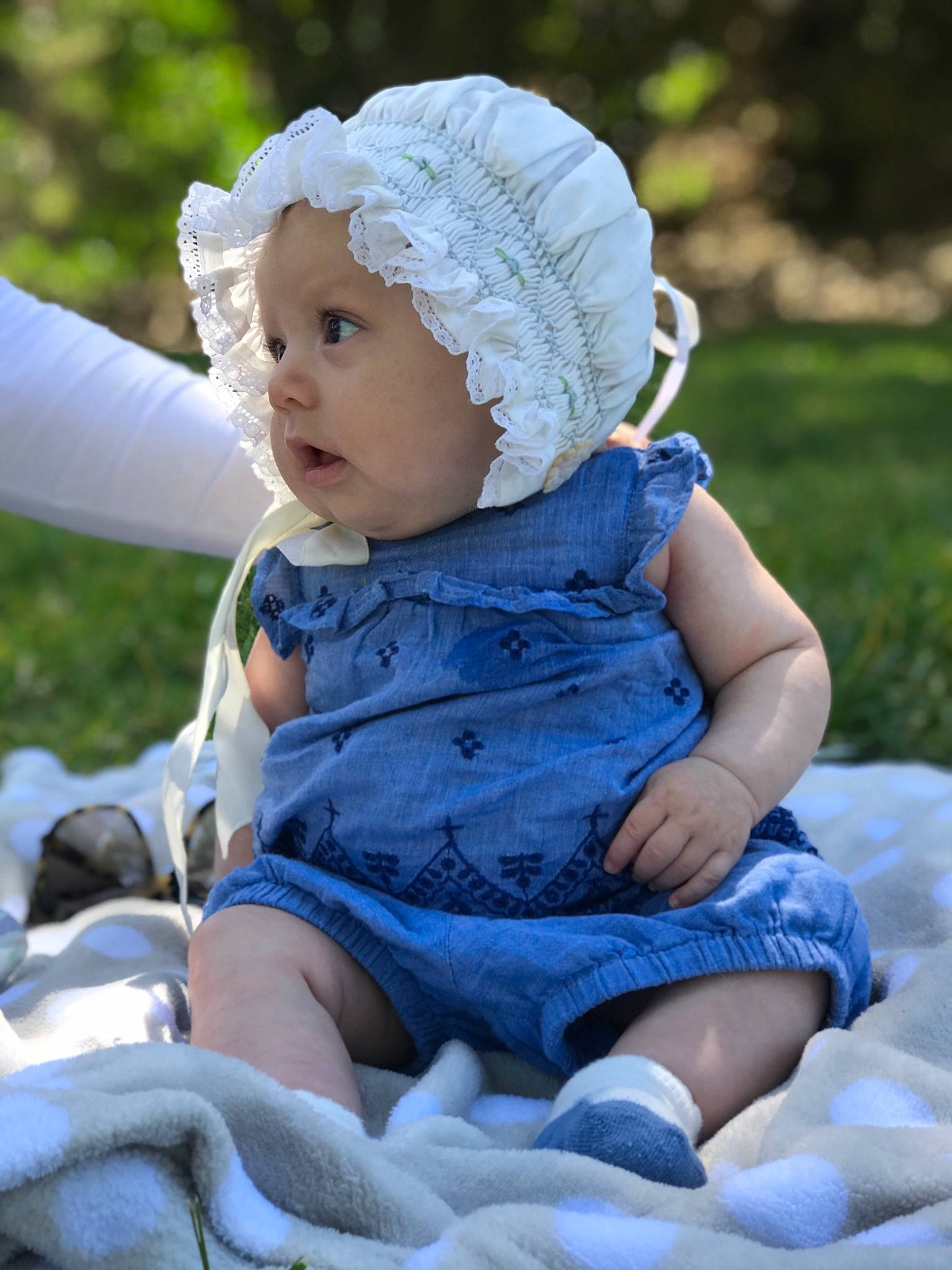 Matilda joined the competition — help win amazing prizes! baby, baby_products, blue, bonnet, child, grass, headgear, person, photography, product, sitting, toddler