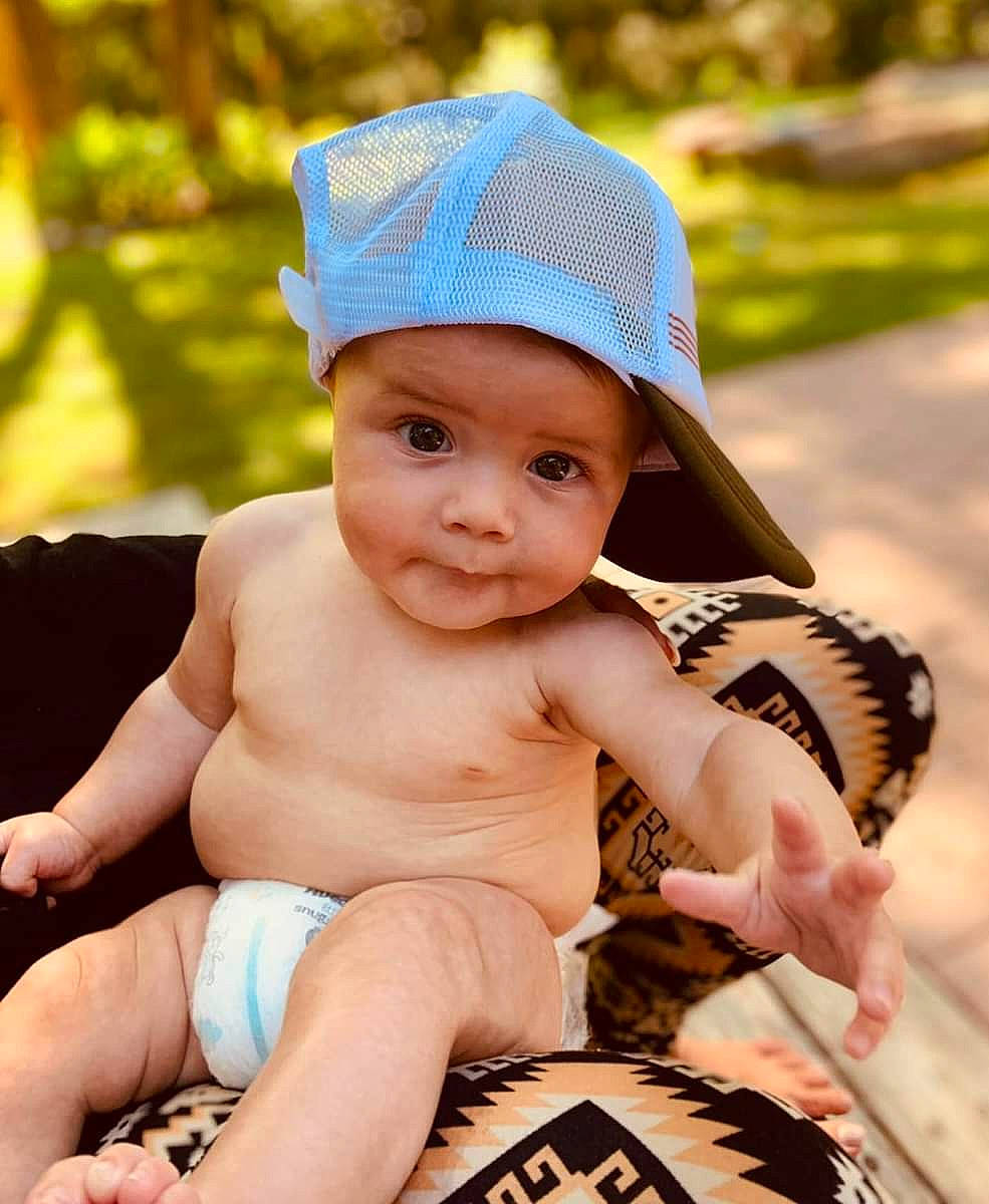 Cannon joined the competition — help win amazing prizes! baby, baby_products, baby_toddler_clothing, cap, child, fashion_accessory, fun, grass, happy, hat, headgear, headwear, jewellery, leisure, nail, pattern, people_in_nature, person, sitting, skin