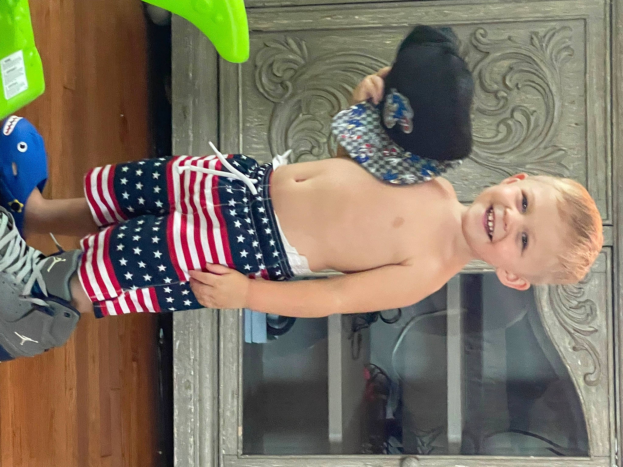 Asher is registered to the contest to win money with this photo: abdomen, calf, chest, elbow, flag_day_usa, flag_of_the_united_states, foot, fun, human_leg, joy, knee, navel, pattern, person, smile, stomach, swimsuit_top, swimwear, thigh, trunk