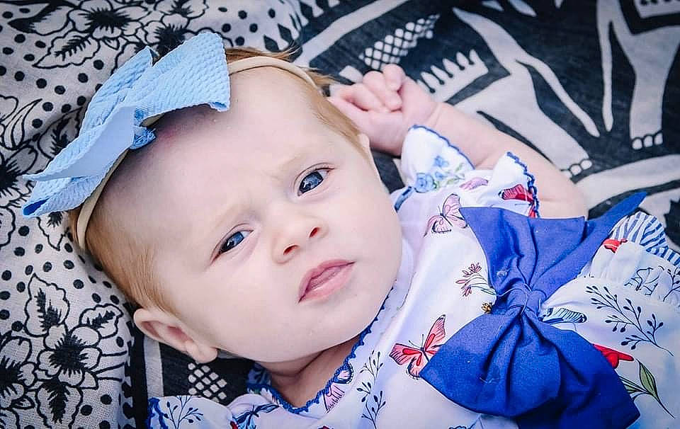 Haisley joined the competition — help win amazing prizes! baby, baby_toddler_clothing, blue, carmine, cheek, child, electric_blue, fashion_accessory, grass, happy, linens, pattern, person, portrait_photography, skin, sleeve, toddler