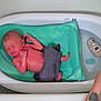 Elliot is registered to the contest to win money with this photo: newborn, baby, bathtub, bath, water, soap, sponge, thermometer, floating, infant, mesh_sling, tattoo, hand, skin, wrapped, relaxing, small, cute, baby_bath, hygiene