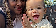 Asa joined the competition — help win amazing prizes! toddler, woman, smile, clapping, stroller, outdoor, daylight, tree, leafy, curly_hair, joyful, happy, casual_clothing, portrait, closeup, baby, nature, person, parent, bonding