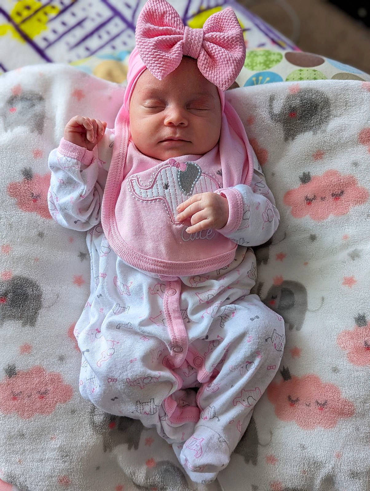 Nevaeh joined the competition — help win amazing prizes! arm, baby, baby_products, baby_toddler_clothing, cheek, child, comfort, dress, face, head, headgear, headwear, human_body, linens, lip, outerwear, person, pink, skin, sleeve