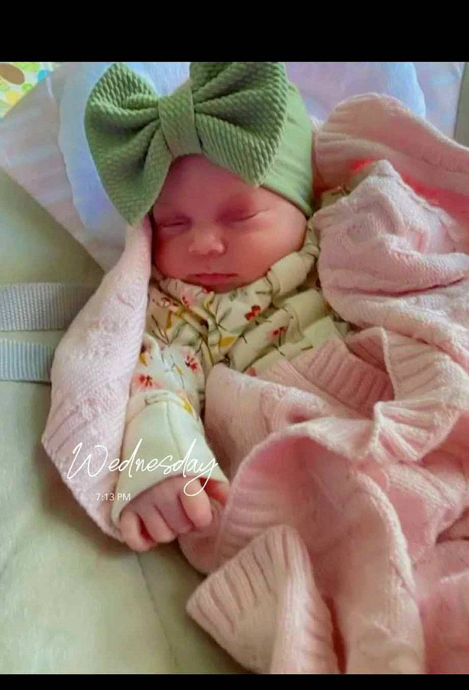 Nevaeh joined the competition — help win amazing prizes! baby, baby_products, baby_sleeping, baby_toddler_clothing, cheek, child, comfort, head, headwear, linens, pattern, peach, person, pink, sleeve, thumb, toddler