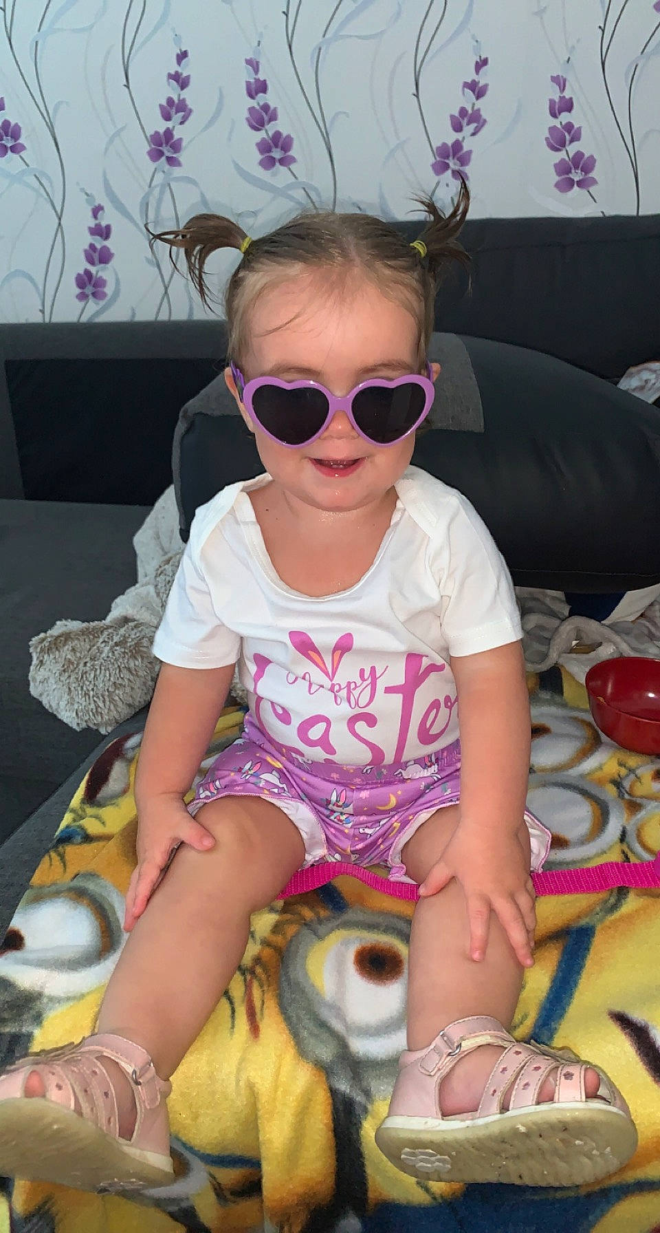 Kassidy participe au concours pour gagner de l'argent avec cette photo : arm, baby_toddler_clothing, clothing, cool, eyewear, glasses, goggles, lap, leg, mouth, person, pink, plant, skin, sleeve, smile, sunglasses, thigh, toddler, vision_care