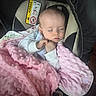 Bella participe au concours pour gagner de l'argent avec cette photo : baby, blanket, car_seat, child, clothing, cozy, cute, face, hands, indoor, infant, peaceful, pink, portrait, resting, safety, seat, sleeping, soft_texture, warning_label