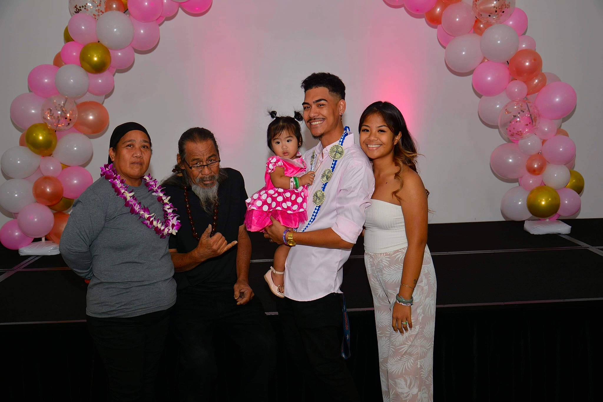 Elliana is registered to the contest to win money with this photo: balloon, belt, ceremony, child, decoration, event, fashion_design, formal_wear, fun, happy, headwear, joy, leisure, magenta, organ, party, party_supply, person, photograph, pink