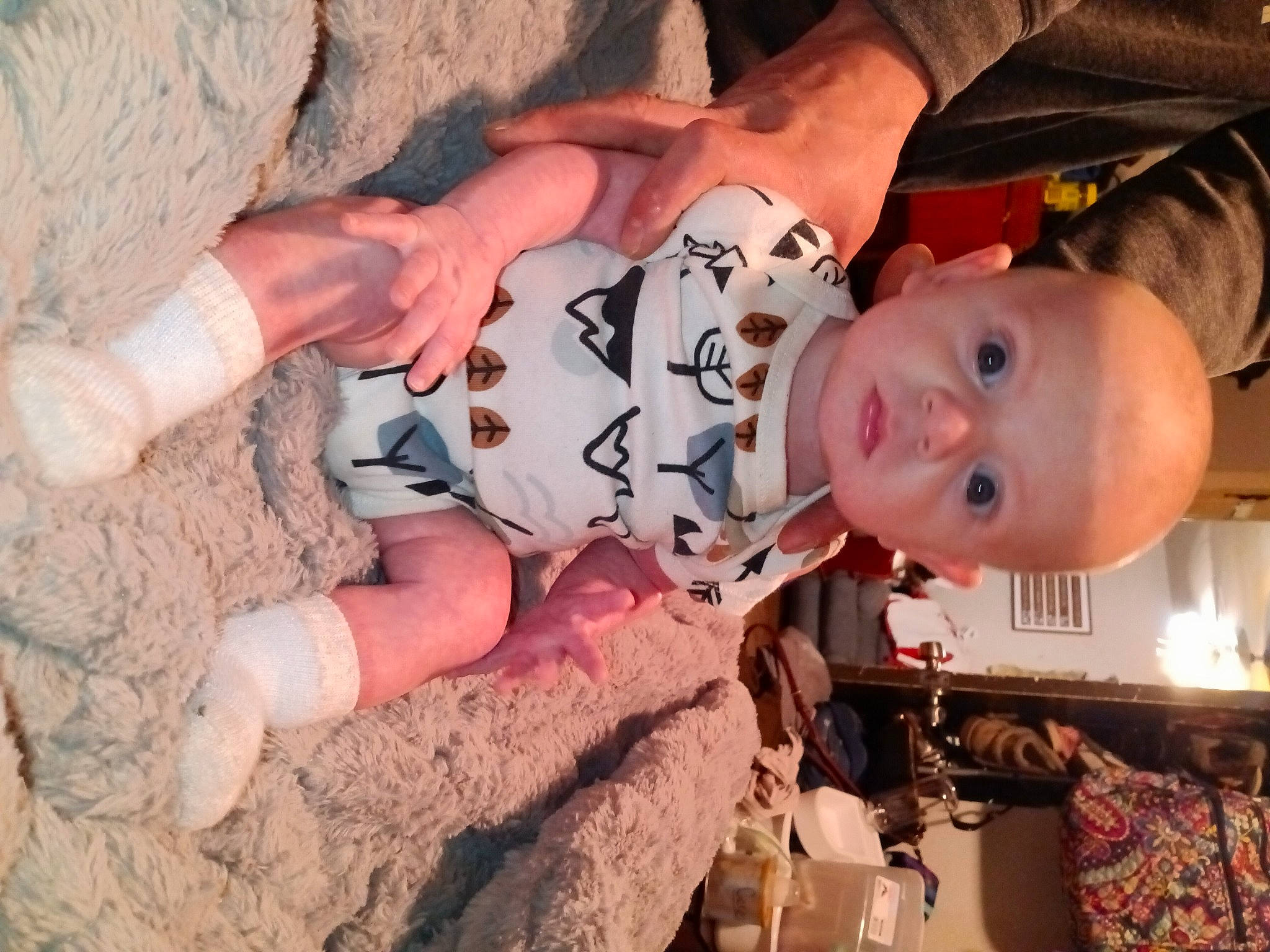 Dominic is registered to the contest to win money with this photo: baby, baby_toddler_clothing, bedrock, child, finger, fun, hand, happy, hat, human, person, rock, sand, sitting, skin, smile, soil, toddler, tree, vacation