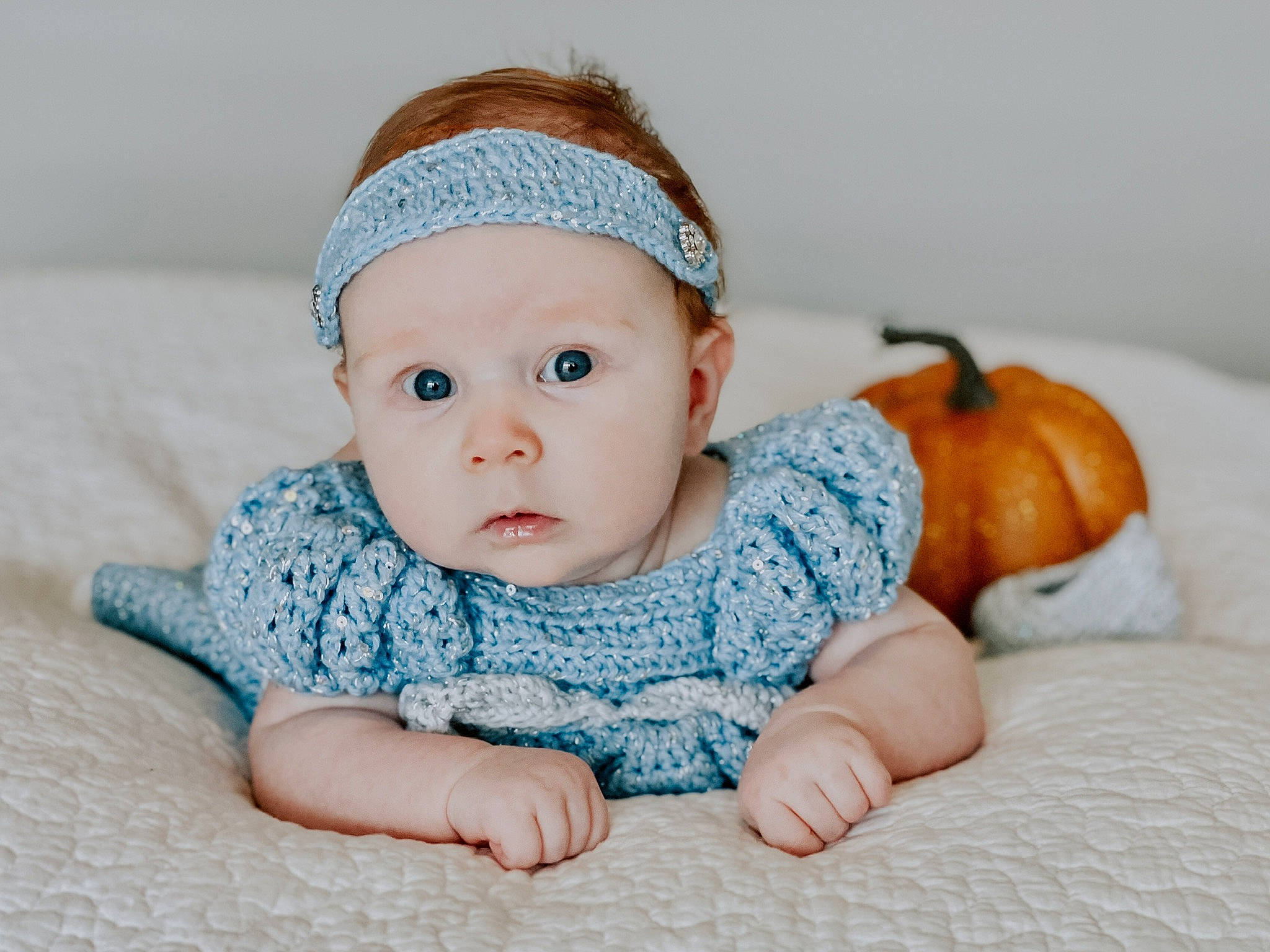 Aubrie joined the competition — help win amazing prizes! baby, baby_sleeping, baby_toddler_clothing, cap, child, comfort, dress, eye, face, fashion_accessory, grass, headband, headwear, linens, pattern, person, sitting, skin, sleeve, textile