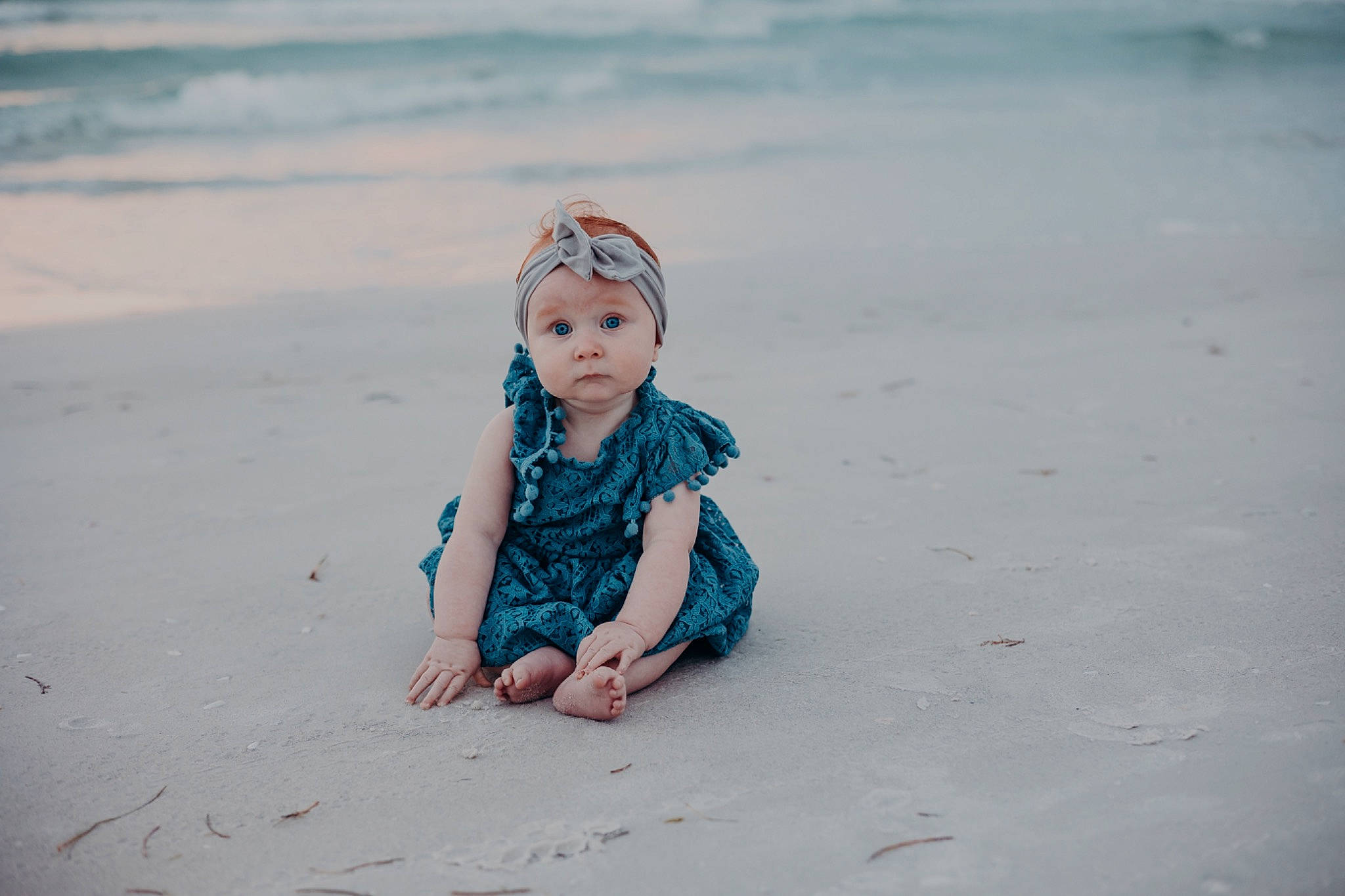 Aubrie joined the competition — help win amazing prizes! baby, beach, body_of_water, cloud, face, fun, grass, happy, headwear, horizon, landscape, leisure, people_in_nature, people_on_beach, person, sand, sky, toddler, travel, tree