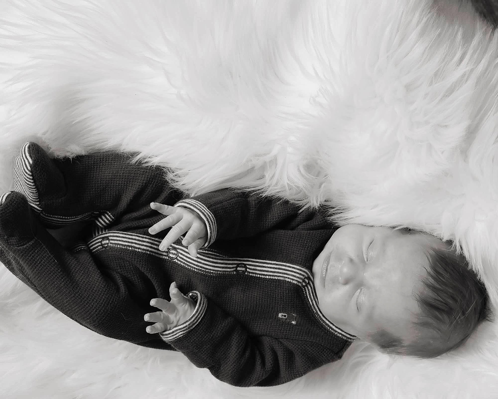 Zarek joined the competition — help win amazing prizes! baby, baby_toddler_clothing, bedtime, child, comfort, fur, human, love, nap, natural_material, person, sleep, textile, white