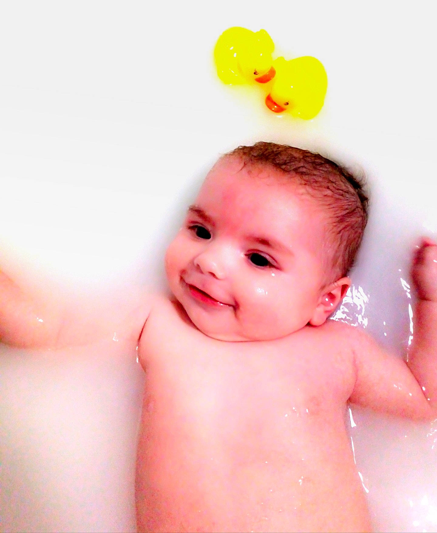 Kamryn joined the competition — help win amazing prizes! baby, baby_bathing, bathing, bathtub, cheek, child, face, finger, hand, person, photography, pink, skin, smile, stomach, toddler, trunk, yellow