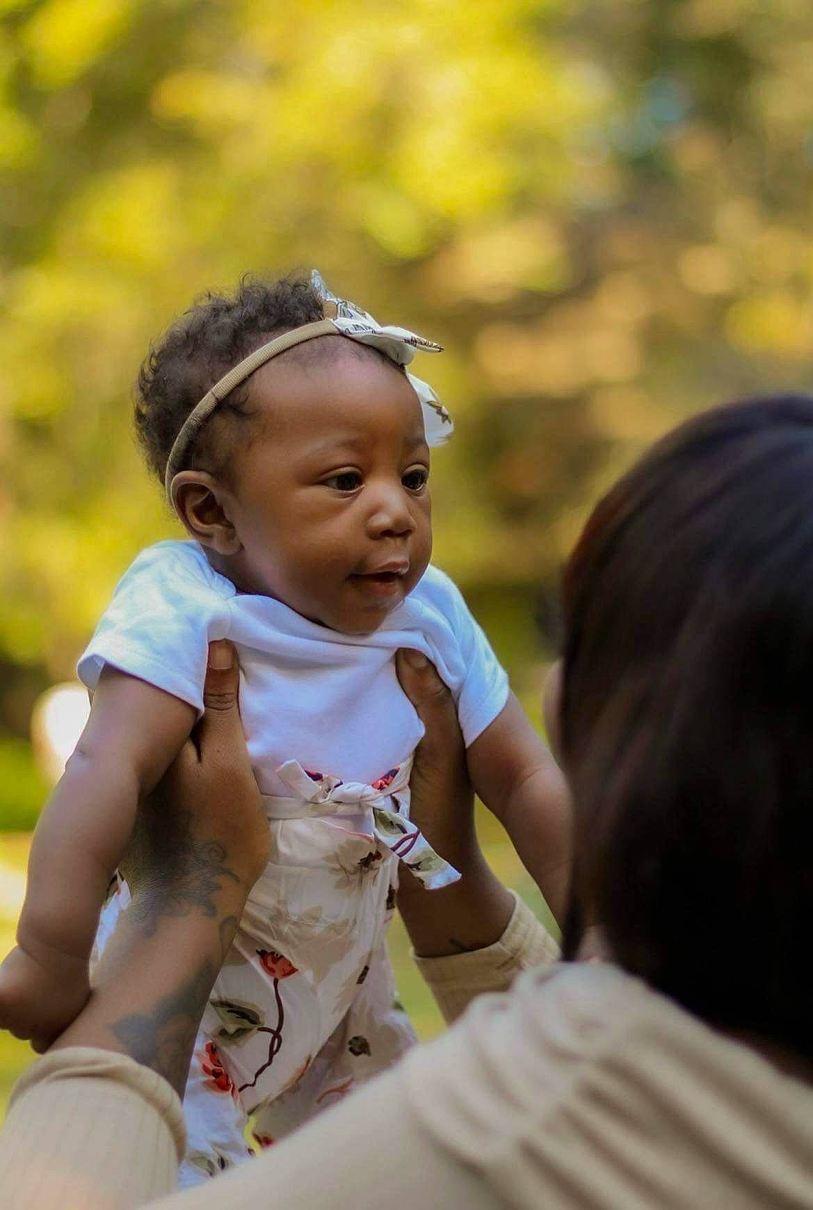 Elia joined the competition — help win amazing prizes! baby, baby_toddler_clothing, child, event, fashion_accessory, fun, grass, happy, hat, headband, jewellery, leisure, people_in_nature, person, recreation, sitting, t_shirt, toddler, tradition