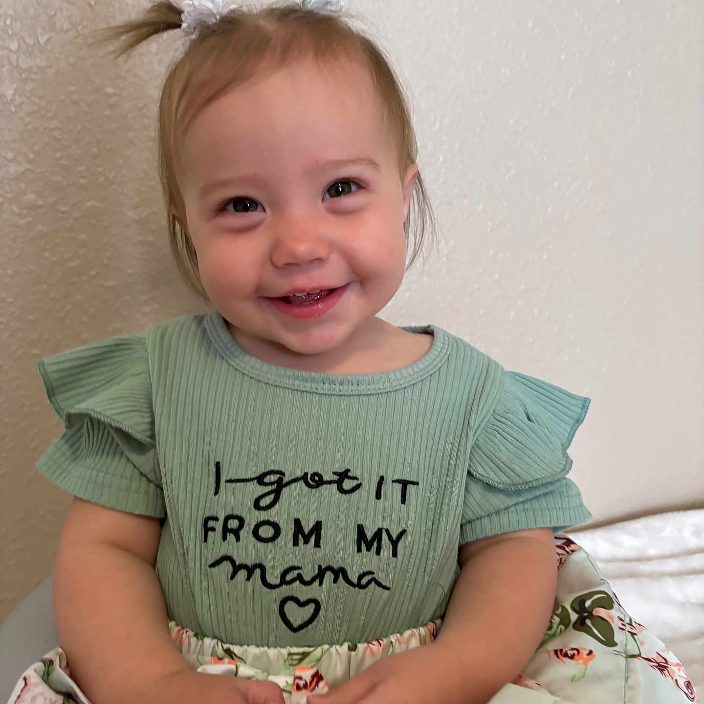 Everleigh is registered to the contest to win money with this photo: accessories, baby, babylaughing, bodypart, clothing, crying, dress, face, finger, hand, happy, head, jewelry, laughing, person, photography, portrait, sitting, smile, t_shirt