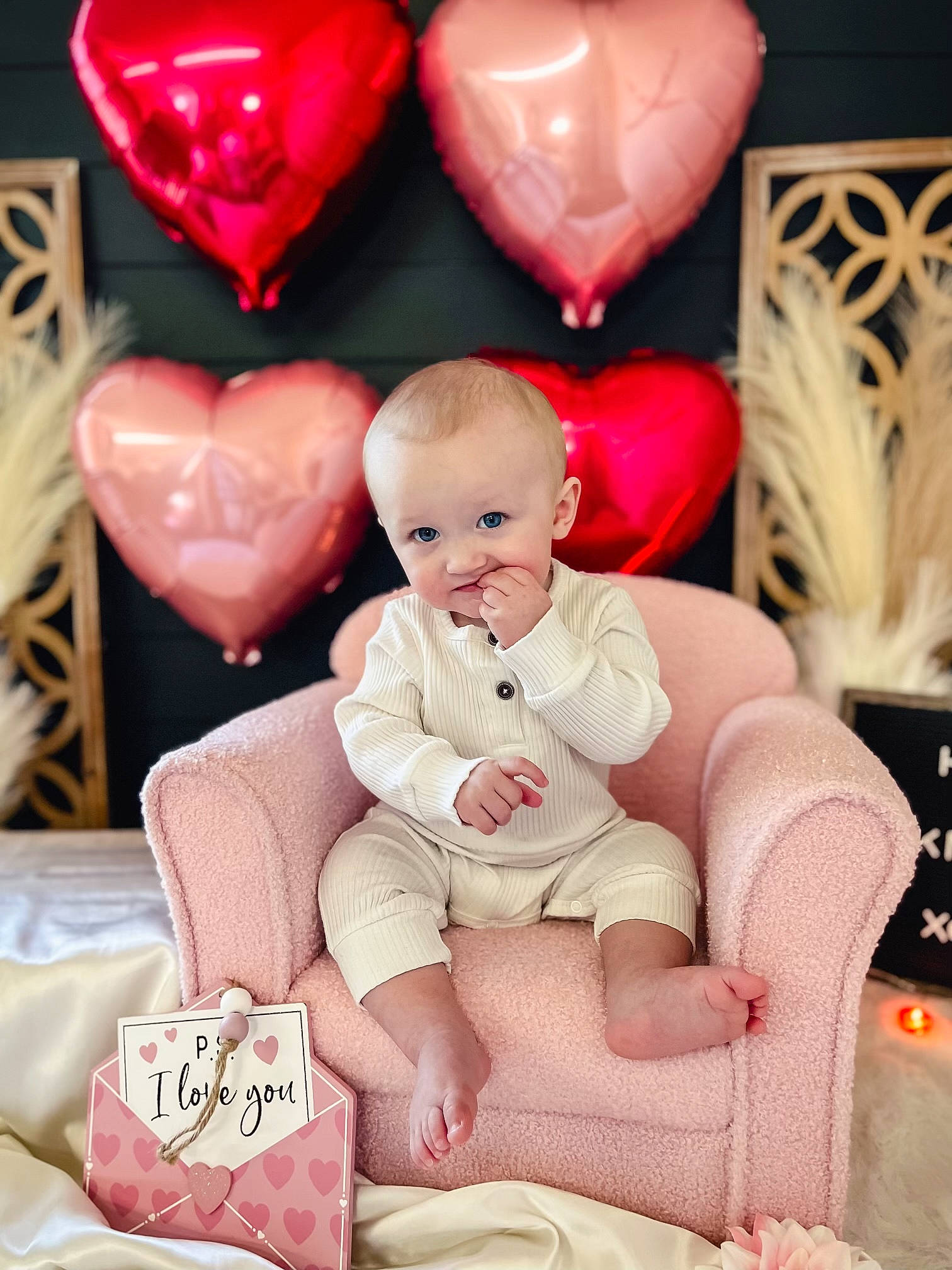 Karson is registered to the contest to win money with this photo: baby, baby_toddler_clothing, beauty, child, comfort, event, face, happy, human_leg, lap, magenta, organ, person, photograph, pink, red, sitting, smile, thigh, toddler