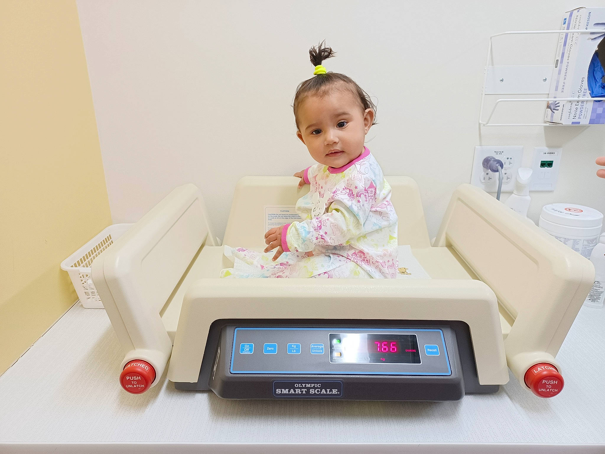 Lola is registered to the contest to win money with this photo: baby, baby_playing_with_toys, baby_products, baby_toddler_clothing, beauty, child, display_device, electronic_device, gadget, home_appliance, machine, multimedia, office_equipment, output_device, person, product, room, sitting, skin, technology