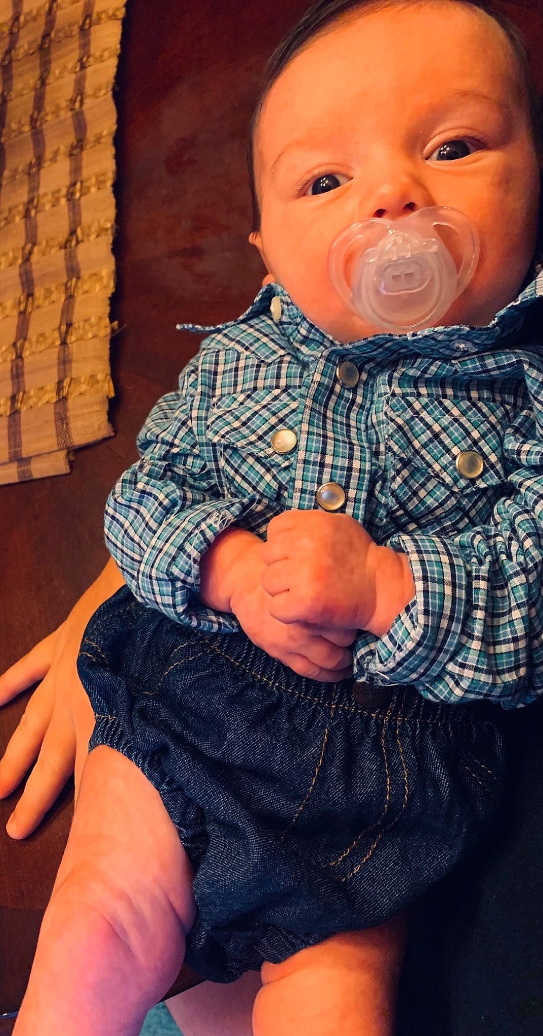 Kolton is registered to the contest to win money with this photo: baby_toddler_clothing, blue, cheek, chin, comfort, eye, facial_expression, hand, head, human, human_body, iris, lip, mouth, nose, person, product, skin, sleeve, stomach