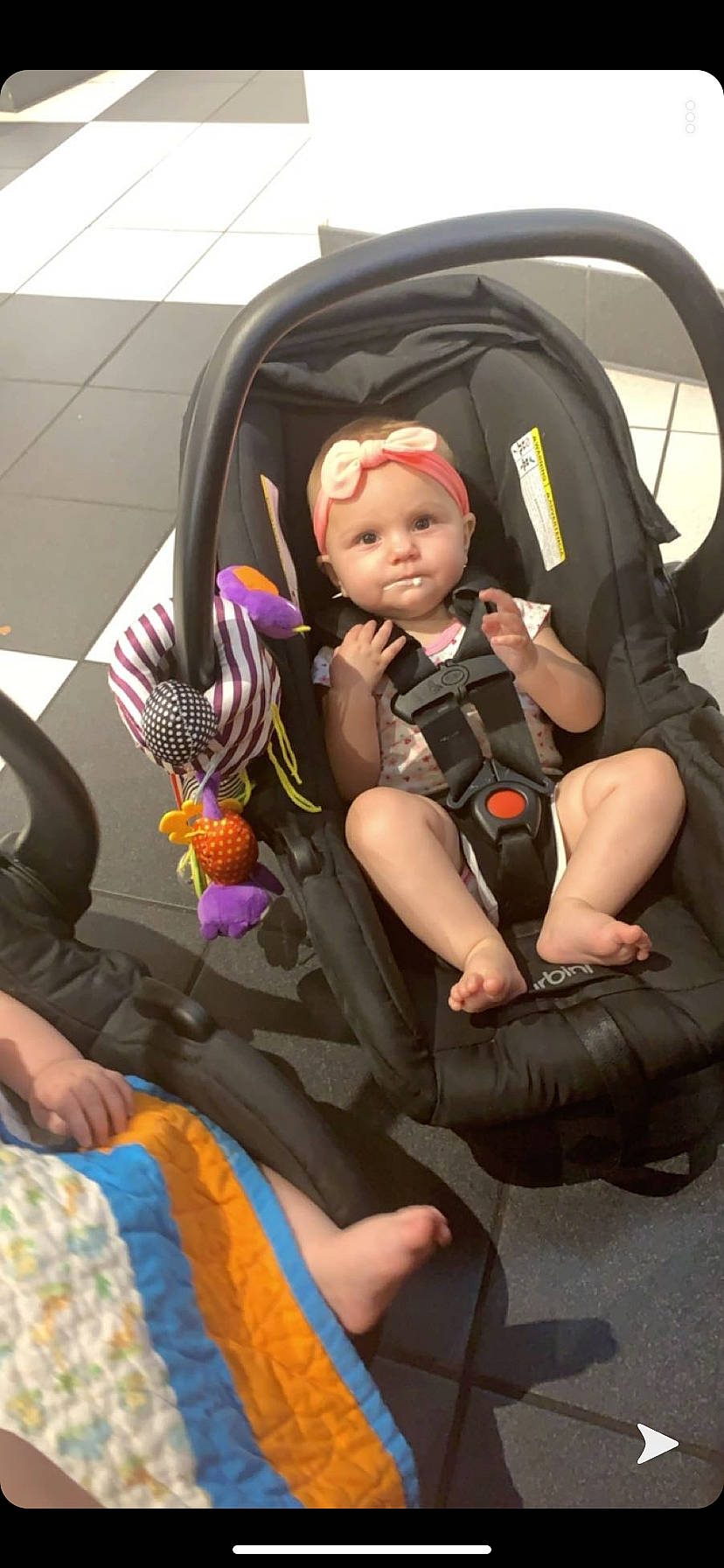 Kinley joined the competition — help win amazing prizes! baby, baby_carriage, baby_in_car_seat, baby_products, car_seat, child, comfort, fun, headwear, person, product, sitting, toddler, vacation
