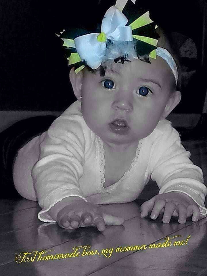 Avyanna is registered to the contest to win money with this photo: baby, child, hair_accessory, headwear, person, photography, surprise, toddler