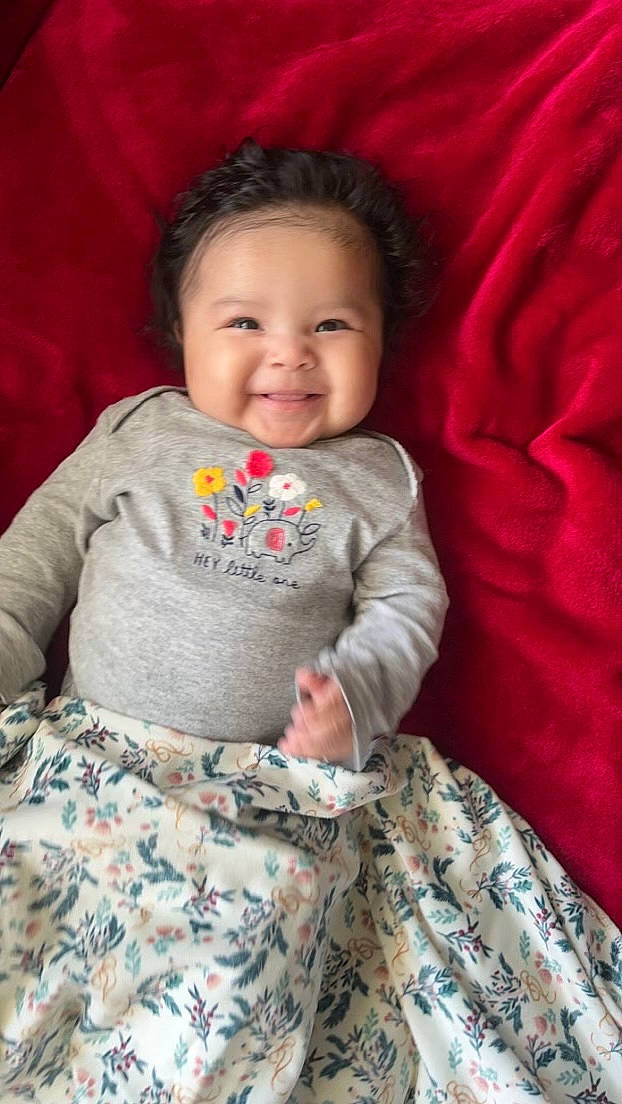 Amayah joined the competition — help win amazing prizes! arm, baby_toddler_clothing, cheek, comfort, dress, eye, face, facial_expression, hairstyle, happy, human_body, iris, joy, lip, neck, nose, person, pink, skin, sleeve