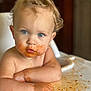 Charlotte joined the competition — help win amazing prizes! toddler, child, messy, high_chair, blue_eyes, curly_hair, food, sauce, face, arms, skin, indoor, table, expression, cute, baby, feeding, closeup, portrait, meal